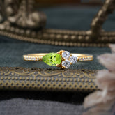 3 Prong Pear Shaped Peridot Promise Wedding Band Ring with Three Round Stone