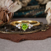 Heart Cut Classic Peridot Engagement Ring Side with 3-stone