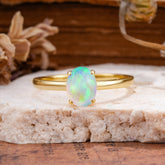 Minimalist Oval Cut 1.5 Carat Opal Solitaire Engagement Ring
