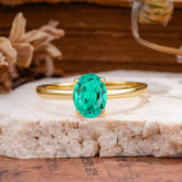 Minimalist Oval Cut 1.5 Carat Emerald Solitaire Engagement Ring