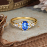 Oval Cut Sapphire Classic Side Stone Engagement Ring