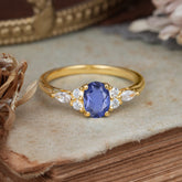 Oval Cut 4 Prong Tanzanite Classic Side Stone Engagement Ring