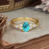 Oval Cut 4 Prong Turquoise Classic Side Stone Engagement Ring