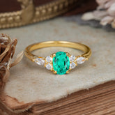 Oval Cut Emerald Classic Side Stone Engagement Ring