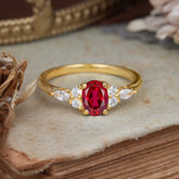 Oval Cut 4 Prong Ruby Classic Side Stone Engagement Ring