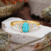 3 Prong Classic Pear Cut Side Stone Turquoise Engagement Ring