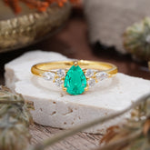 3 Prong Classic Pear Cut Side Stone Emerald Engagement Ring
