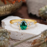 3 Prong Classic Pear Cut Side Stone Emerald Engagement Ring