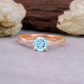 Classic Round Cut Aquamarine Engagement Ring with Twisted Band