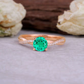 Classic Round Cut Emerald Engagement Ring with Twisted Band