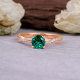 Classic Round Cut Emerald Engagement Ring with Twisted Band