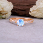 Classic Round Cut Moonstone Engagement Ring with Twisted Band