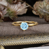 Round Cut Aquamarine Timeless Solitaire Engagement Ring with Twisted Band