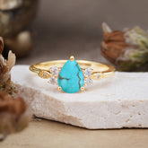 3 Prong Pear Cut Classic Turquoise Engagement Ring with Side Stone