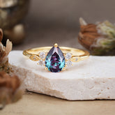 Pear Cut Classic Alexandrite Engagement Ring with Side Stone