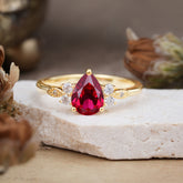Pear Cut Classic Ruby Engagement Ring with Side Stone