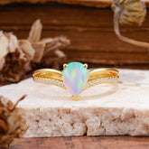 1.25 Carat Pear Cut Opal Ring Split Shank Engagement Ring