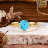 1.25 Carat Pear Cut Turquoise Ring Split Shank Engagement Ring