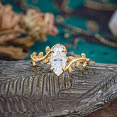 Nature-Inspired Leafy Branch 4-Prong Marquise Moissanite Engagement Ring