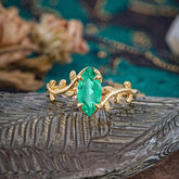 Nature-Inspired Leafy Branch 4-Prong Marquise Emerald Engagement Ring