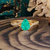 Timeless Vintage 4-Prong Pear-Cut Emerald Engagement Ring