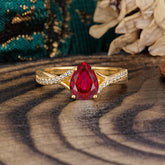 Timeless Vintage 4-Prong Pear-Cut Ruby Engagement Ring
