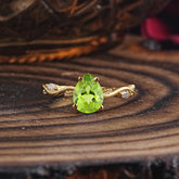 Nature-Inspired Classic 4-Prong Pear-Cut Peridot Engagement Ring