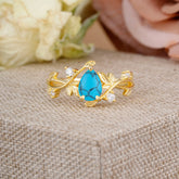Branch-Inspired 3-Prong Pear-Cut Turquoise Engagement Ring