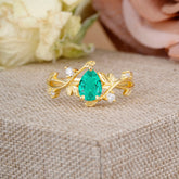 Branch-Inspired 3-Prong Pear-Cut Emerald Engagement Ring