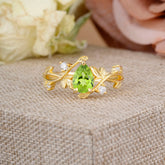 Branch-Inspired 3-Prong Pear-Cut Peridot Engagement Ring