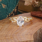 Artistic Twisted Shank Oval Cut Moissanite Engagement Ring