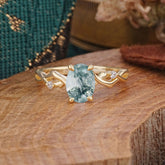 Artistic Twisted Shank Oval Cut Moss Agate Engagement Ring