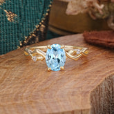 Artistic Twisted Shank Oval Cut Aquamarine Engagement Ring