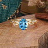 Artistic Twisted Shank Oval Cut Aquamarine Engagement Ring