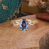 Artistic Twisted Shank Oval Cut Alexandrite Engagement Ring
