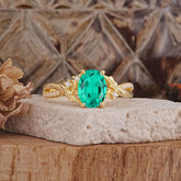 Nature Inspired 4 Prong Golden Vine Oval Cut Emerald Ring