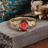 4 Prong Oval Garnet Gold Ring for Timeless Love