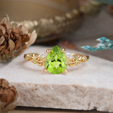 Romantic 4-Prong Pear-Cut Peridot Engagement Ring