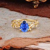 Nature-Inspired Vine-Entwined 4-Prong Teardrop-Cut Sapphire Engagement Ring
