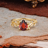 Nature-Inspired Vine-Entwined 4-Prong Teardrop-Cut Garnet Engagement Ring