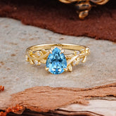 Nature-Inspired Vine-Entwined 4-Prong Teardrop-Cut Aquamarine Engagement Ring