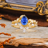 Nature-Inspired 3-Prong Oval-Cut Sapphire Engagement Ring Set with Vine Accents