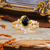 Nature-Inspired 3-Prong Oval-Cut Natural Black Onyx Engagement Ring Set With Vine Accents