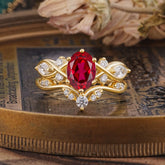 The Sumptuous Oval - Cut Ruby Halo Ring