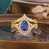 Elegant Pear-Cut 3 Prong Natural Tanzanite Engagement Ring Set