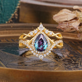 Elegant Pear-Cut Alexandrite Engagement Ring Set