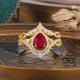 Elegant Pear-Cut Ruby Engagement Ring Set