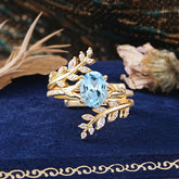 Delicate Leaf Embellished 4 - Prong Oval - Cut Aquamarine Ring Sets