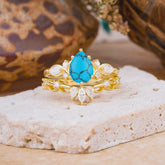 6 Prong Romantic Vine Themed Pear Cut Turquoise Rings