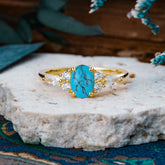 Sophisticated 4-Prong Oval Cut Turquoise Engagement Ring